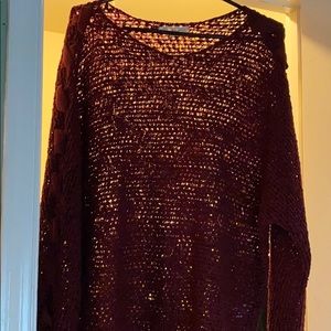 Maroon sweater with lace up arms